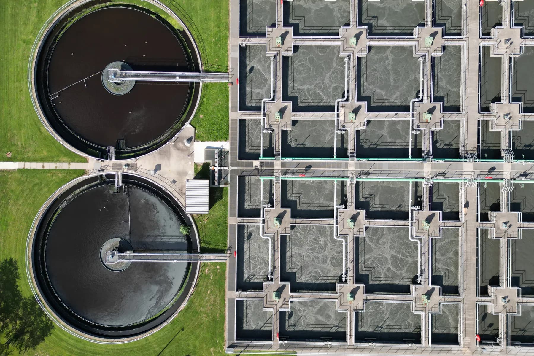 Aerial view of an industrial wastewater treatment facility with filtration tanks